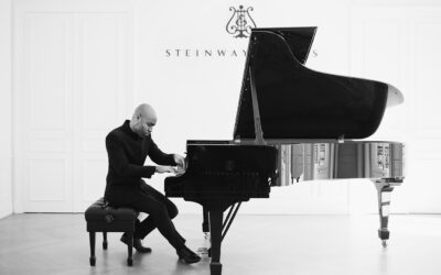 Aaron Diehl sitting at Steinway piano